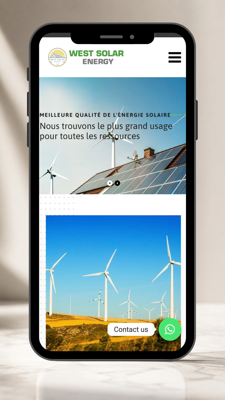 West Solar Energy homepage displayed in a mobile phone mockup.